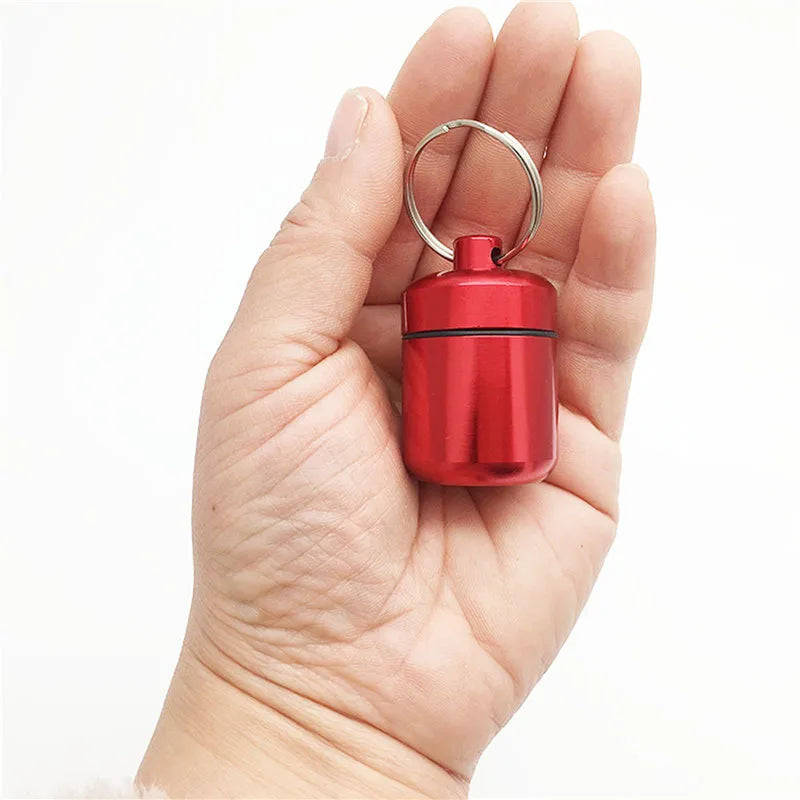 TitanSeal™ Waterproof Aluminum Pill Keychain – Ultra-Lightweight Emergency Storage & Earplug Container