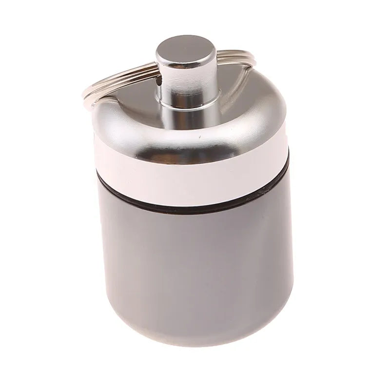 TitanSeal™ Waterproof Aluminum Pill Keychain – Ultra-Lightweight Emergency Storage & Earplug Container