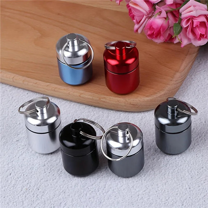 TitanSeal™ Waterproof Aluminum Pill Keychain – Ultra-Lightweight Emergency Storage & Earplug Container
